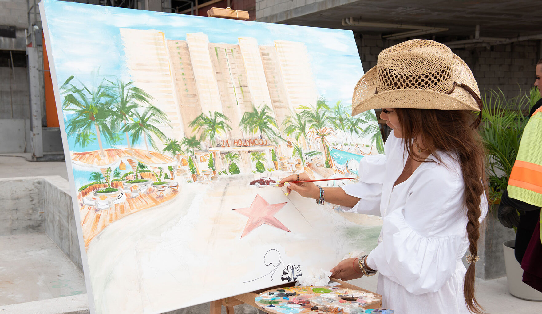 21 Hollywood’s topping off ceremony