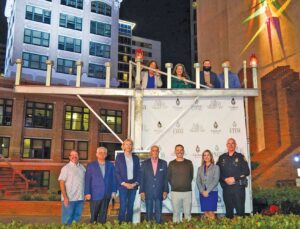 Menorah Lighting: Standing above the menorah (left to right): Andrea Zelman, City of Tampa Attorney; Abbye Feeley, City of Tampa Administrator for Development & Economic Opportunity; Rabbi Mendy Dubrowski, Chabad CHAI of South Tampa Executive Director and Rabbi; and Mark Wright, Jewish community leader. Bottom Row (left to right): Jeffrey Berger, Tampa JCCs & Federation Co-President; Commissioner Harry Cohen, Hillsborough County District 1; Mayor Jane Castor, City of Tampa; Councilman Charlie Miranda, City of Tampa District 6, Councilman Guido Maniscalco, City of Tampa District 2; Diane Ventresca, Assistant Special Agent in Charge, FBI Tampa; and Chief Lee Bercaw, Tampa Police Department.