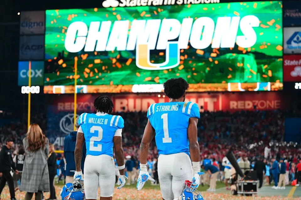 Mississippi Rebels wide receiver De’zhaun Stribling (1) reacts with wide receiver Harrison Wallace III (2) after the game against the Miami Hurricanes during the 2026 Fiesta Bowl and semifinal game. IMAGN IMAGES via Reuters Connect