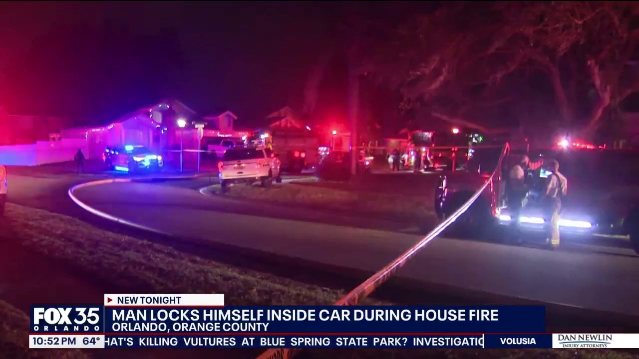 Man barricades himself in car after Orange County house fire