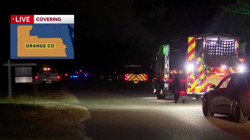 Woman shot, critically injured, deputies surround home in Orange County