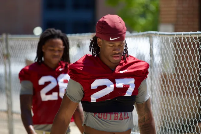 FSU football's Ashlynd Barker walks into the first practice of preseason camp on Wednesday, July 30, 2025