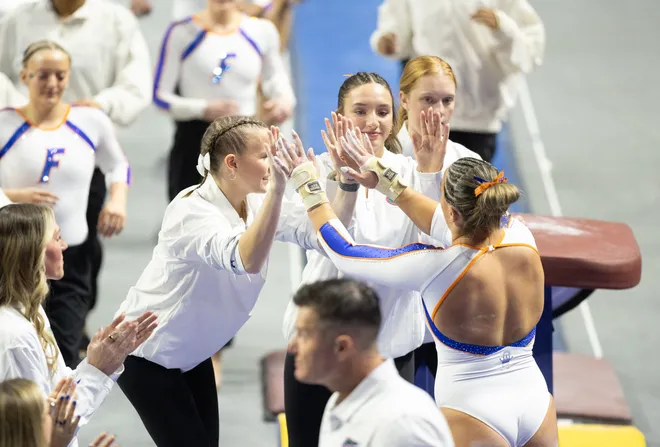 Florida Skylar Draser celebrates a successful vault at Steven C. O'Connell Center Exactek arena in Gainesville, FL on Friday, January 16, 2026. [Alan Youngblood/Gainesville Sun]