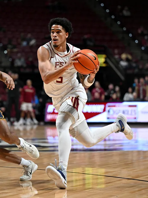 Jan 28, 2026; Tallahassee, Florida, USA; Florida State Seminoles guard Kobe MaGee (5) during the first half against the California Golden Bears at Donald L. Tucker Center. Mandatory Credit: Melina Myers-Imagn Images