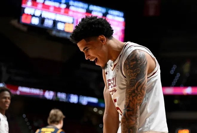 Jan 28, 2026; Tallahassee, Florida, USA; Florida State Seminoles guard Kobe MaGee (5) reacts during the second half against the California Golden Bears at Donald L. Tucker Center. Mandatory Credit: Melina Myers-Imagn Images
