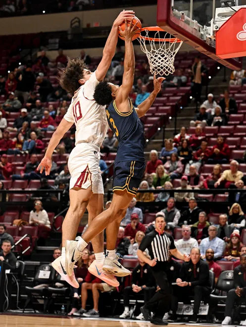 Jan 28, 2026; Tallahassee, Florida, USA; Florida State Seminoles guard Lajae Jones (10) blocks a shot by California Golden Bears guard Semetri Carr (3) during the first half at Donald L. Tucker Center. Mandatory Credit: Melina Myers-Imagn Images