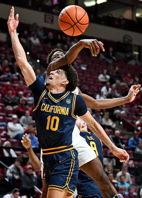 Jan 28, 2026; Tallahassee, Florida, USA; California Golden Bears guard Justin Pippen (10) has his layup blocked by Florida State Seminoles forward Thomas Bassong (3) during the second half at Donald L. Tucker Center. Mandatory Credit: Melina Myers-Imagn Images