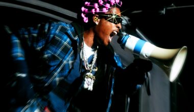 Photo of a man screaming at a megaphone