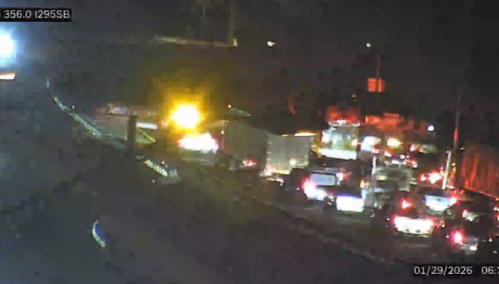 Crash with injuries involving overturned semi-truck blocks 2 northbound lanes on I-295 at I-10