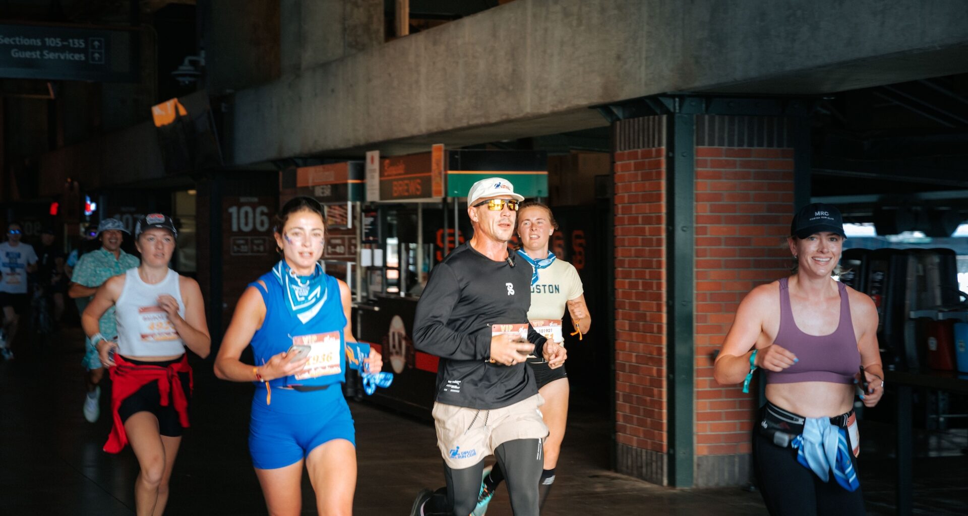 photo of a group of people running