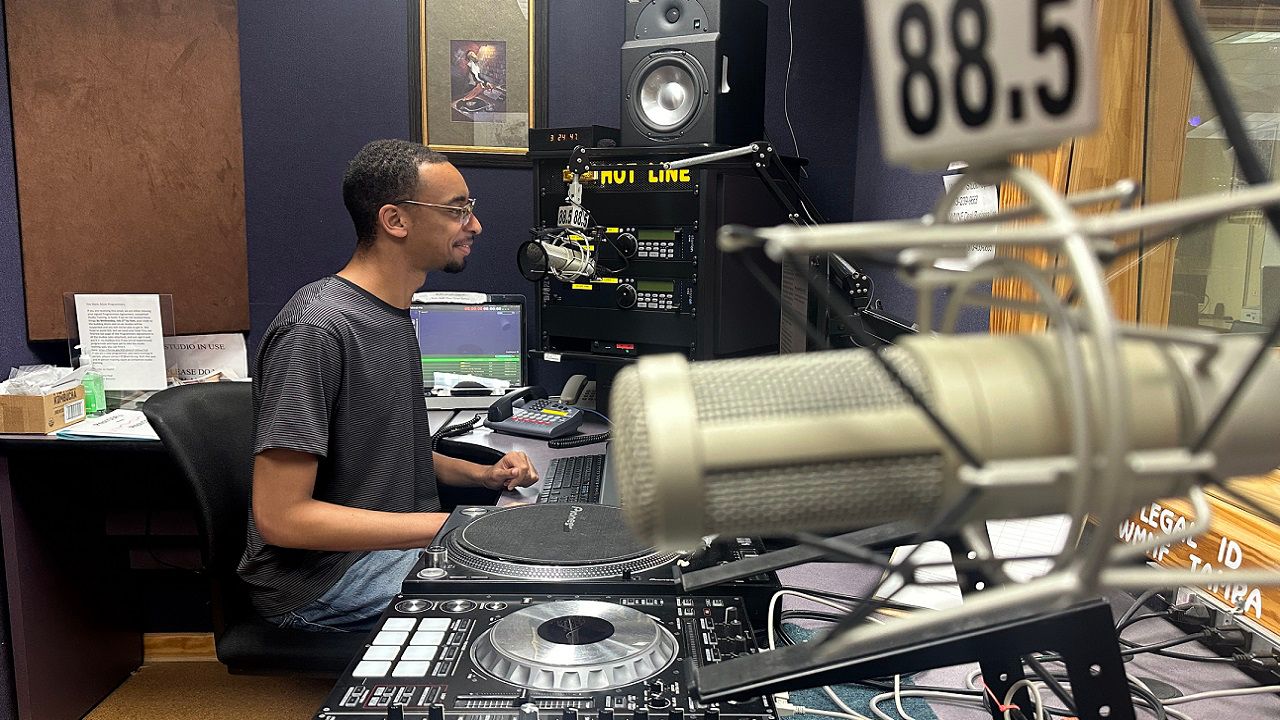 Chris Young, an anchor and reporter with WMNF, said public radio and public media in general in America is so important. (Spectrum News/Sarah Blazonis)