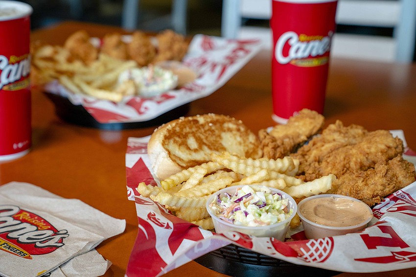 A Raising Cane's Chicken Tender's box combo comes with tenders, crinkle-cut fries, Cane's sauce, Texas toast and a drink.