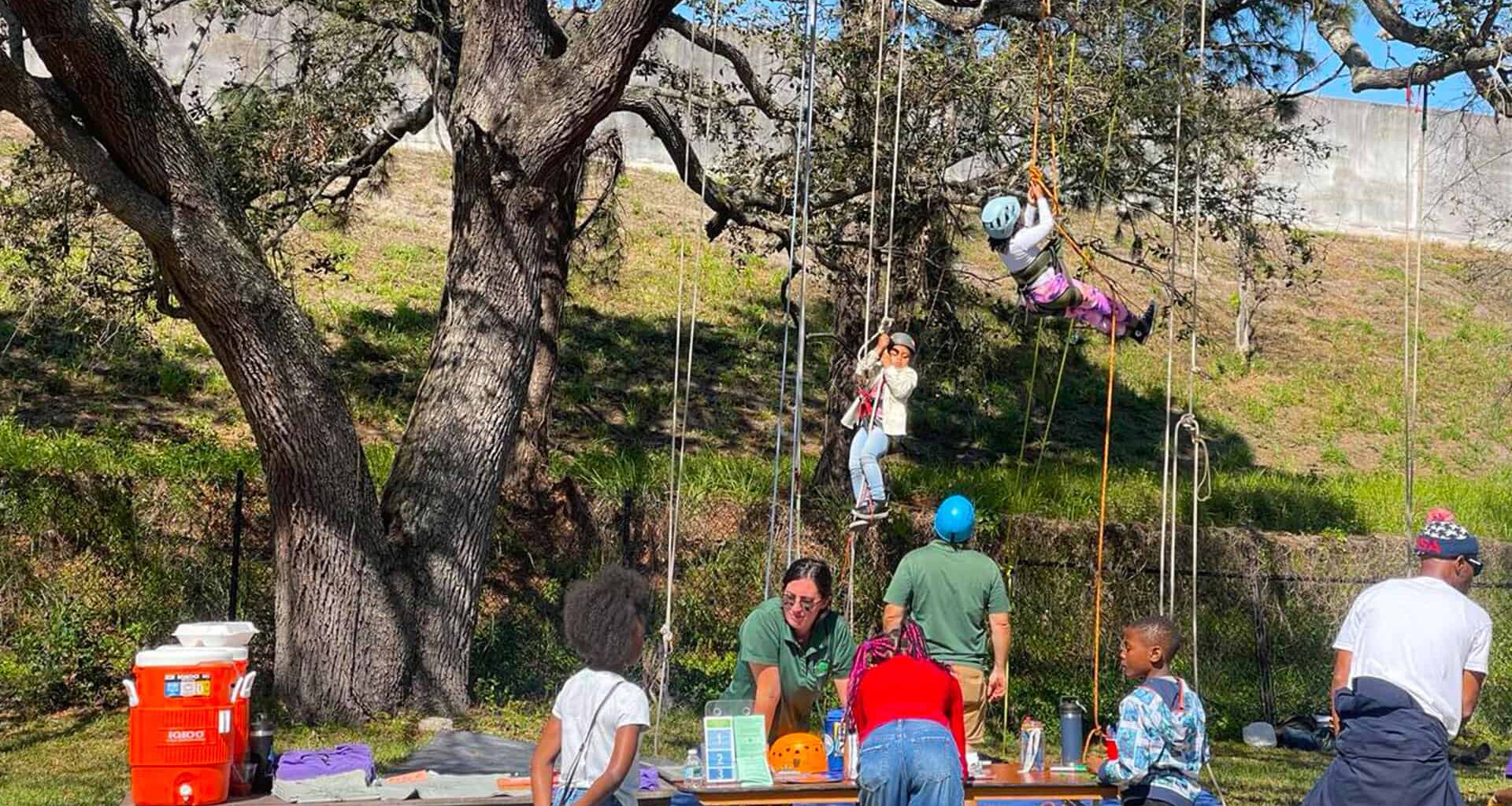 Kids learn climbing at Tampa Bay Collard Greens Festival