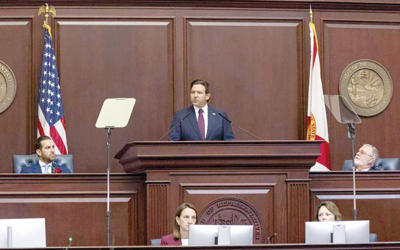 Florida Governor Ron DeSantis delivers his State of the State address as Florida House Speaker Daniel Perez (left) and Florida Senate President Ben Albritton (right) listen Tuesday. (MATIAS J. OCNER/Miami Herald/TNS)