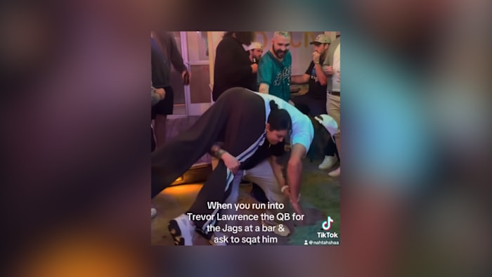 Jaguars fan goes viral after squatting Trevor Lawrence at local bar