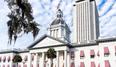 Photograph of the old Florida State Capitol in Tallahassee taken from the front of the building. The New Capitol building stands behind it. (Photo: ©JHVE Photo)