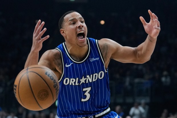 Orlando Magic guard Desmond Bane (3) reacts during an NBA basketball game between Orlando Magic and Memphis Grizzlies in Berlin, Germany, Thursday, Jan. 15, 2026. (AP Photo/Ebrahim Noroozi)