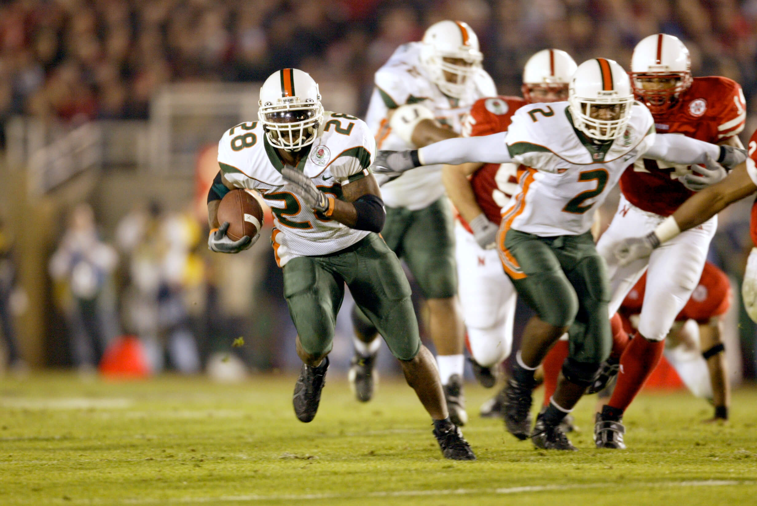 Clinton Portis runs with the football for Miami against Nebraska in the 2002 Rose Bowl
