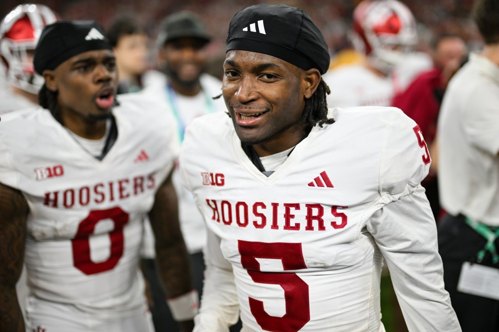 Indiana Hoosiers DB D'Angelo Ponds (5) celebrates winning the Big Ten Championship football game between the Indiana Hoosiers and the Ohio State Buckeyes on December 6, 2025 at Lucas Oil Stadium in Indianapolis, IN.
