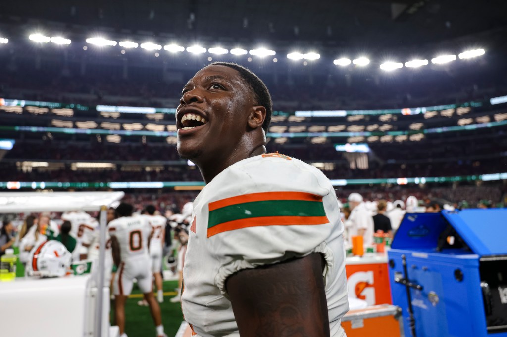 Elija Lofton reacts during the fourth quarter against the Ohio State Buckeyes after the College Football Playoff Quarter Final Game at AT&T Stadium on December 31, 2025 in Arlington, Texas.