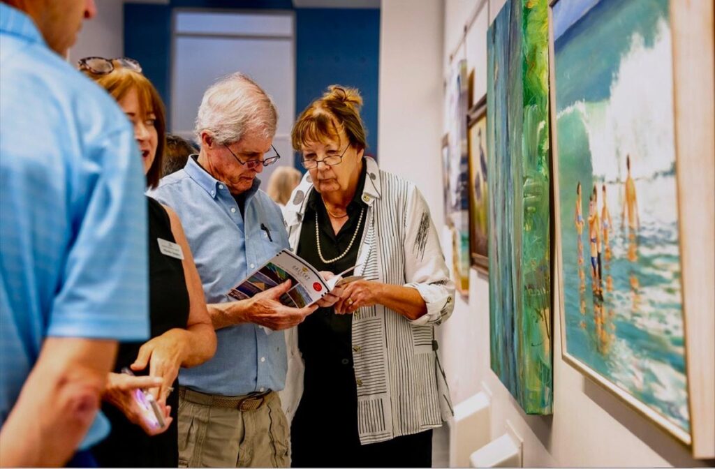 Guests perusing Tour Guide booklet. Photo courtesy of Martin Artisans Guild