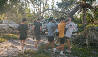 Members of FSU's Interfraternity Council help move a tree limb following Hurricane Helene in Perry, Florida, on Sept. 29, 2024. (Department of Fraternity and Sorority Life)