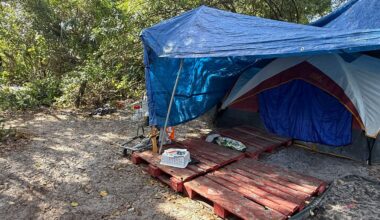A homeless person is living in this tent in a homeless camp in east Orange County. (Spectrum News