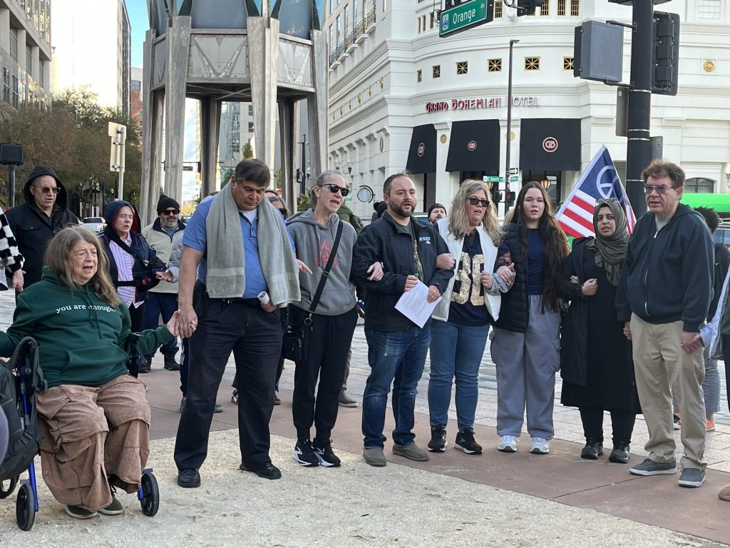 Police monitor vigil for immigrants in Orlando