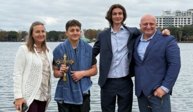 14-year-old Jason Gogsadze dove into Lake Eola and found the gold cross, receiving a special blessing from his church, St. George Orthodox Church. (Spectrum News/Emma Delamo)