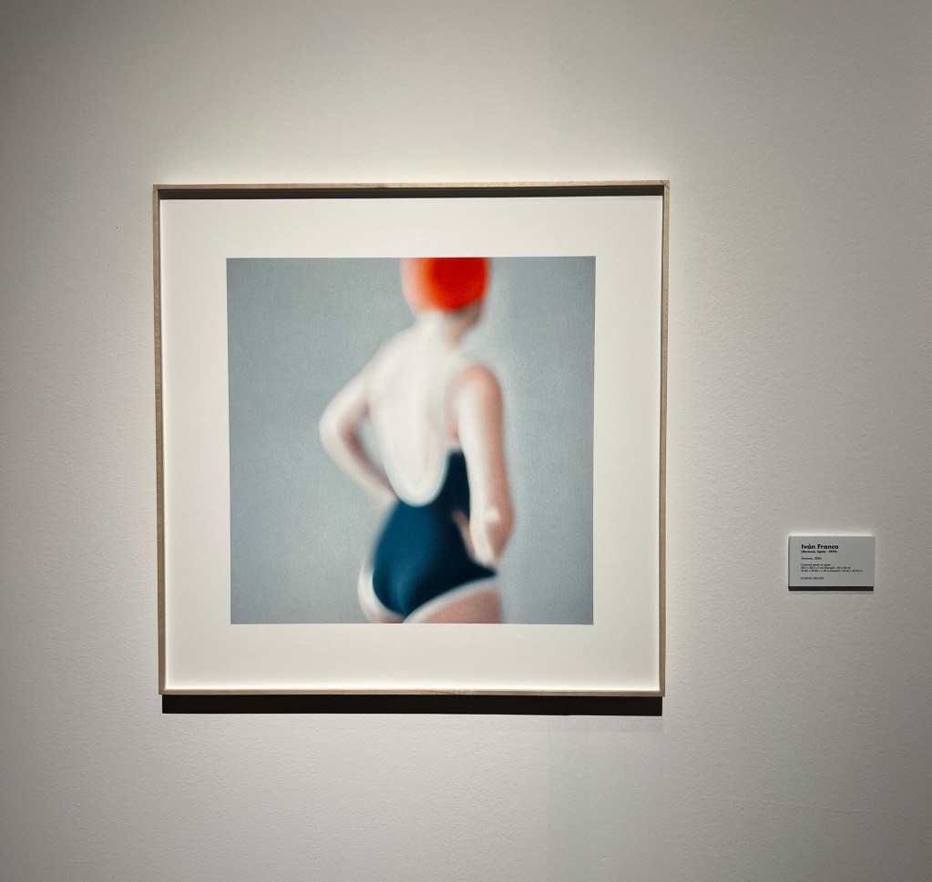 Ivan Franco's Swimmer, a hyperrealistic reproduction of a Polaroid made with a unique crayon technique.