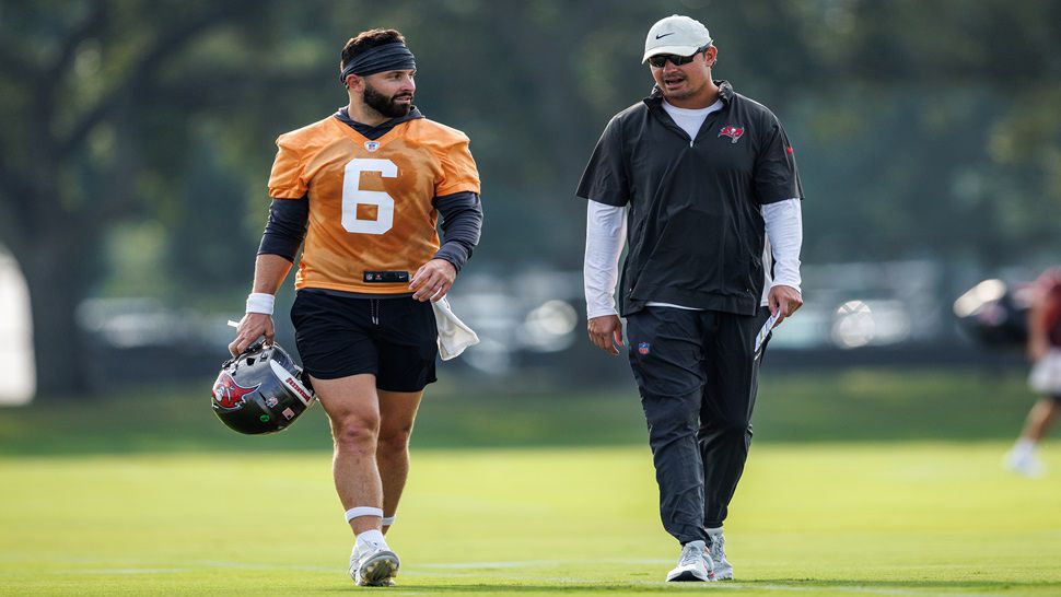 TAMPA, FL - August 08, 2024 - Quarterback Baker Mayfield #6 and Pass Game Coordinator Josh Grizzard of the Tampa Bay Buccaneers during 2024 Training Camp at AdventHealth Training Center. Photo By Doug DeFelice/Tampa Bay Buccaneers