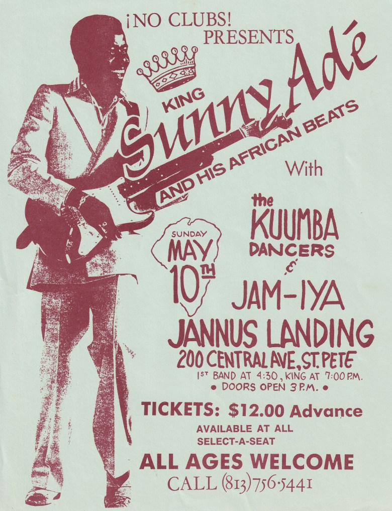 A vintage, vertical concert flyer printed in maroon ink on a light grey background for No Clubs Presents King Sunny Adé and His African Beats. The left side features a full-length, stylized halftone image of a musician in a suit playing an electric guitar. The event is listed for Sunday, May 10, at Jannus Landing in St. Petersburg.
