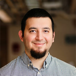 A thumbnail of a smiling man