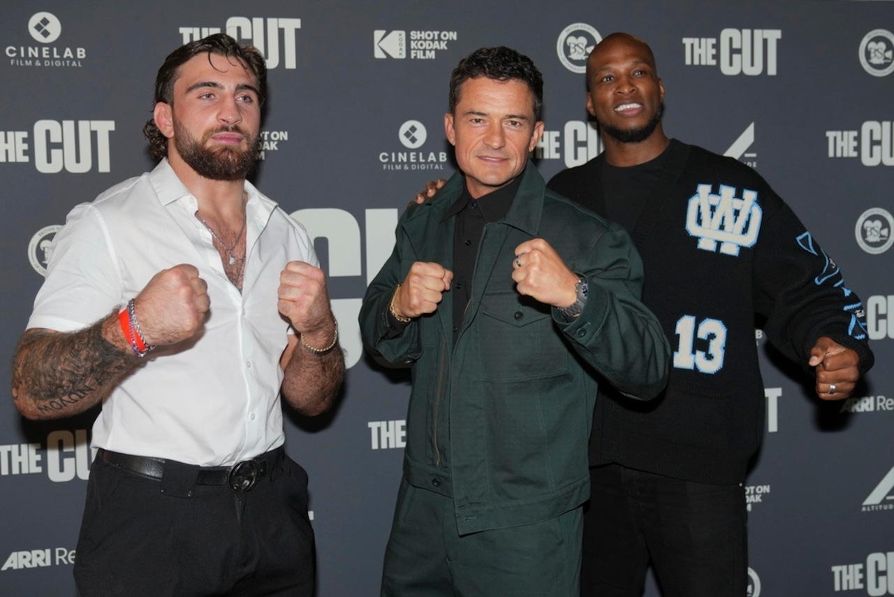 Norbert Novenyi Jr., actor Orlando Bloom and MMA fighter Michael 'Venom' Page