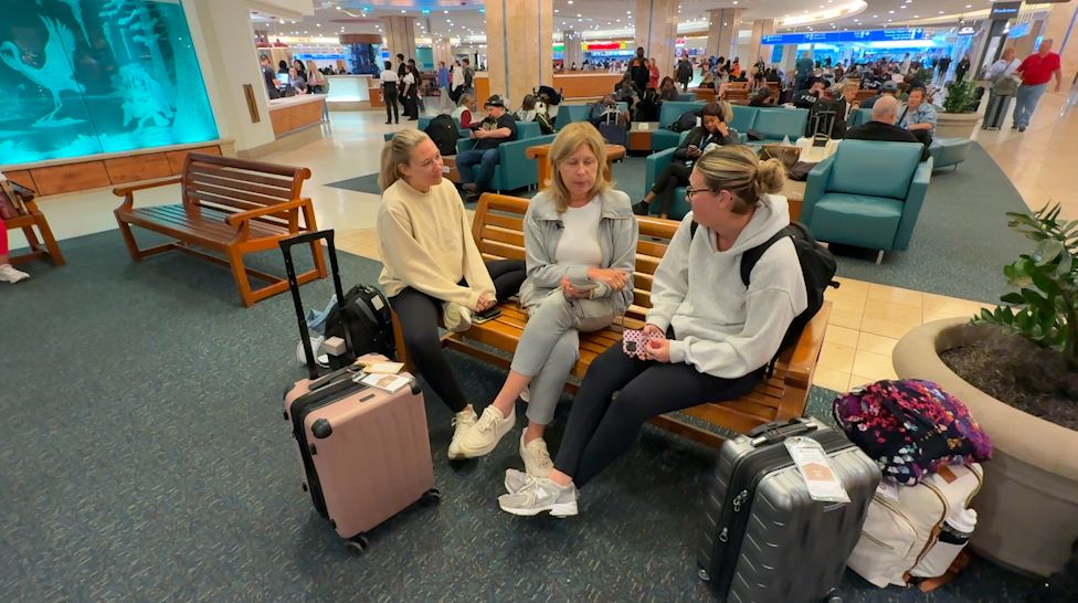 The massive winter storm moving through the U.S. over the weekend delayed the Hisler family from flying out of MCO. (Spectrum News/Barry Short)