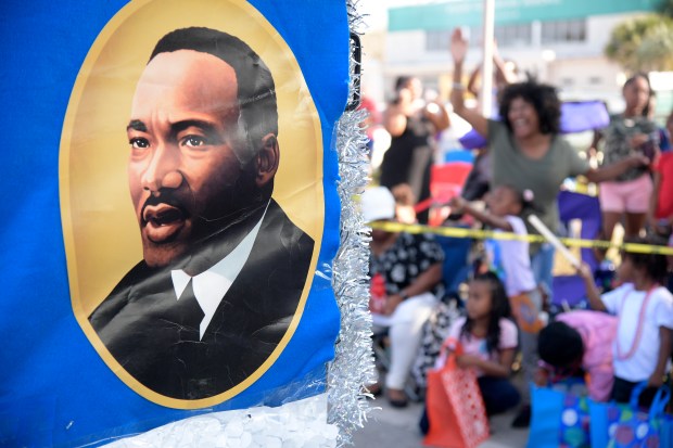 A portrait of Martin Luther King Jr. is viewed on a float during the Martin Luther King Jr. Day Parade Saturday, Jan. 19, 2019, in Eatonville, Fla. (Orlando Sentinel file)