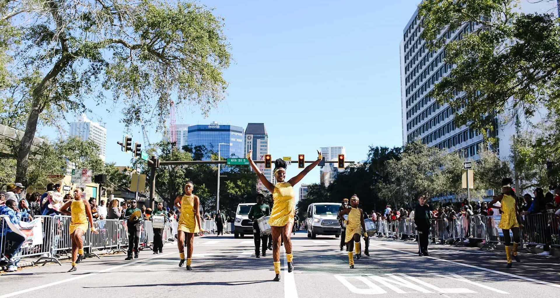 a marching band performs in a parade