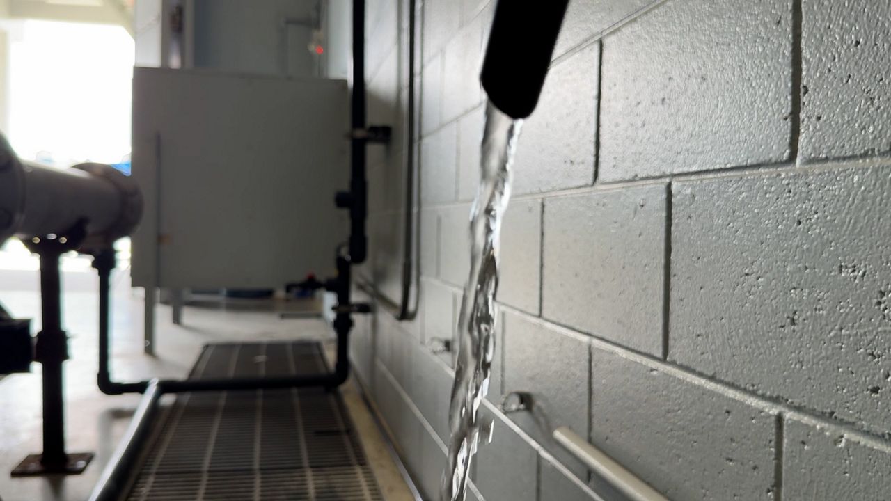 Water flows from the faucet at the PureAlta facility in Altamonte Springs. (Spectrum News)