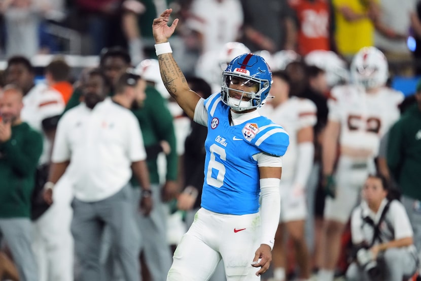 Mississippi quarterback Trinidad Chambliss (6) celebrates after a two-point conversion...