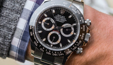 Rolex Cosmograph Daytona Watch Black Ceramic Bezel on a man's left wrist