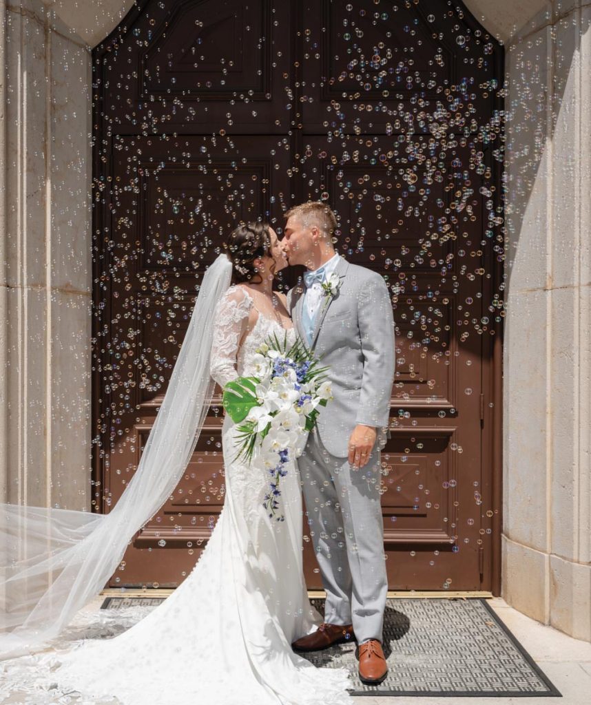 Samantha Williams Travis and Jacob Travis got married at St. Christopher Catholic Church in Hobe Sound. Photo by Tommy Allore