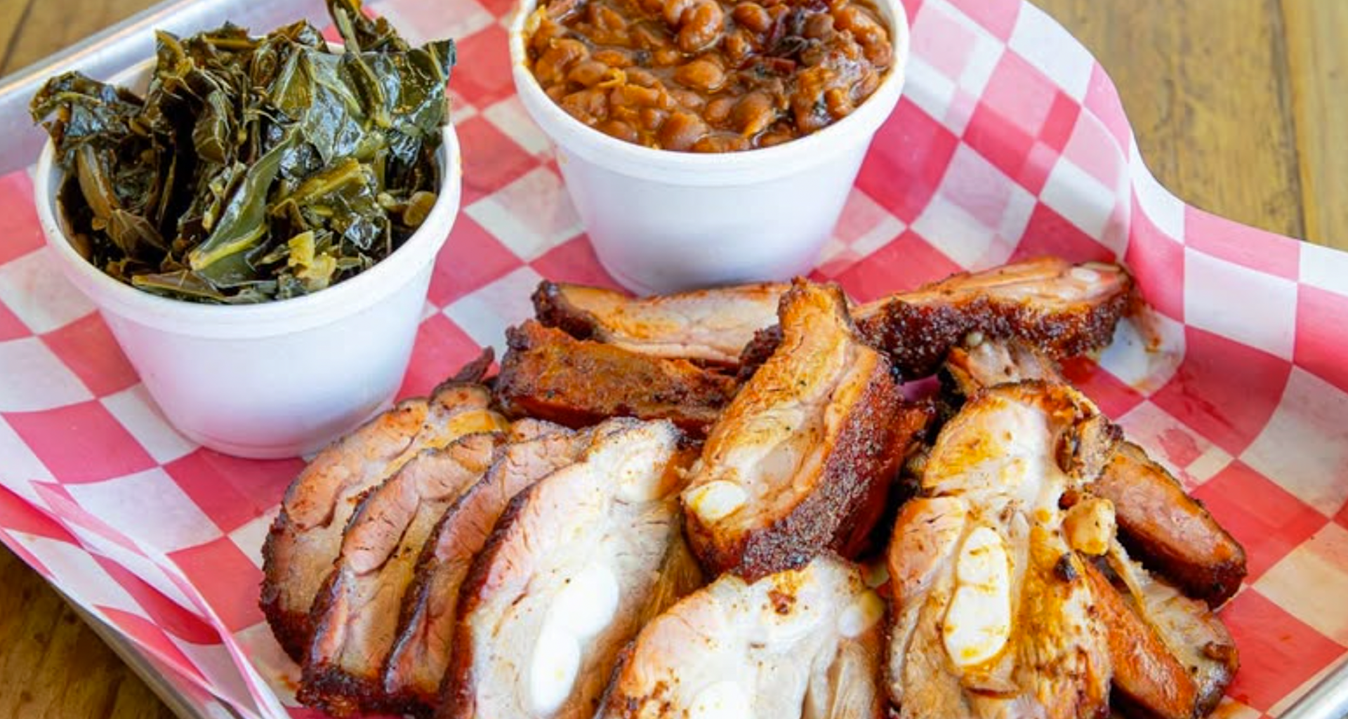 barbeuce platter with collard greens and baked beans