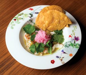 Shrimp aguachile with avocado, lime, and fresh tostadas. Photo by Salar Abduaziz