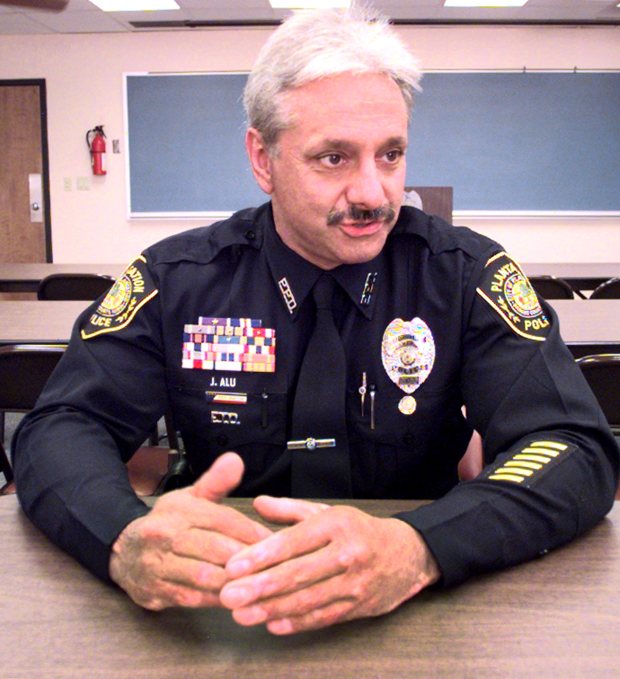 Joe Alu, a former Plantation Police officer and Palm Beach County Sheriff's deputy, died on Dec. 24, 2025. Pictured in 1999, Alu was one of two officers severely burned while trying to rescue to teens being held hostage in 1995. (Sun Sentinel file photo)