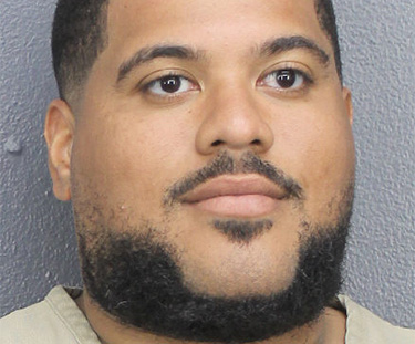 Man charged in assault of woman found dead on Hollywood beach