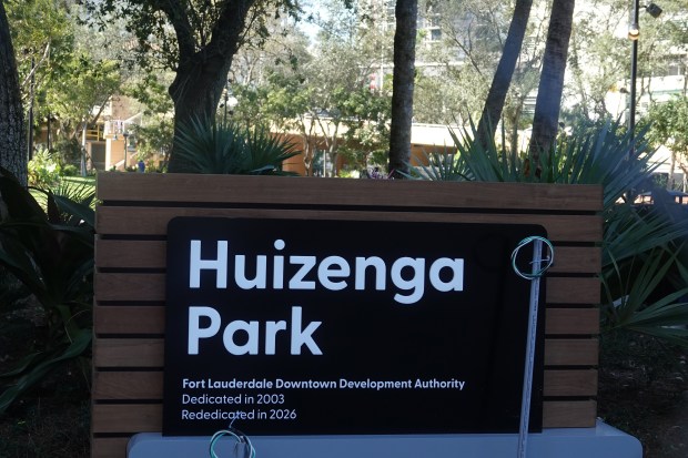 Huizenga Park in downtown Fort Lauderdale, shown on Tuesday, has been fenced off to the public during a two-year redesign. The park will reopen on Jan. 24. (Joe Cavaretta/South Florida Sun Sentinel)