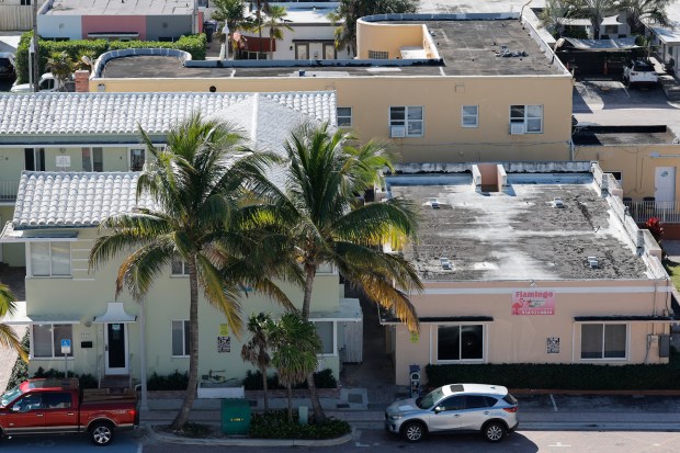 The Sea Angel, left, and the Flamingo Hollywood Beach Hotel are shown on McKinley Street in Hollywood on Jan. 9. Both would be demolished along with nine other low-rise properties if a developer wins a Live Local lawsuit against the city. (Amy Beth Bennett/South Florida Sun Sentinel)