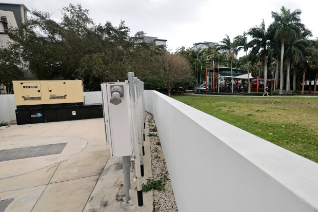 A sewage lift station takes up green space at Peter Feldman Park in downtown Fort Lauderdale on Thursday. (Amy Beth Bennett/South Florida Sun Sentinel)