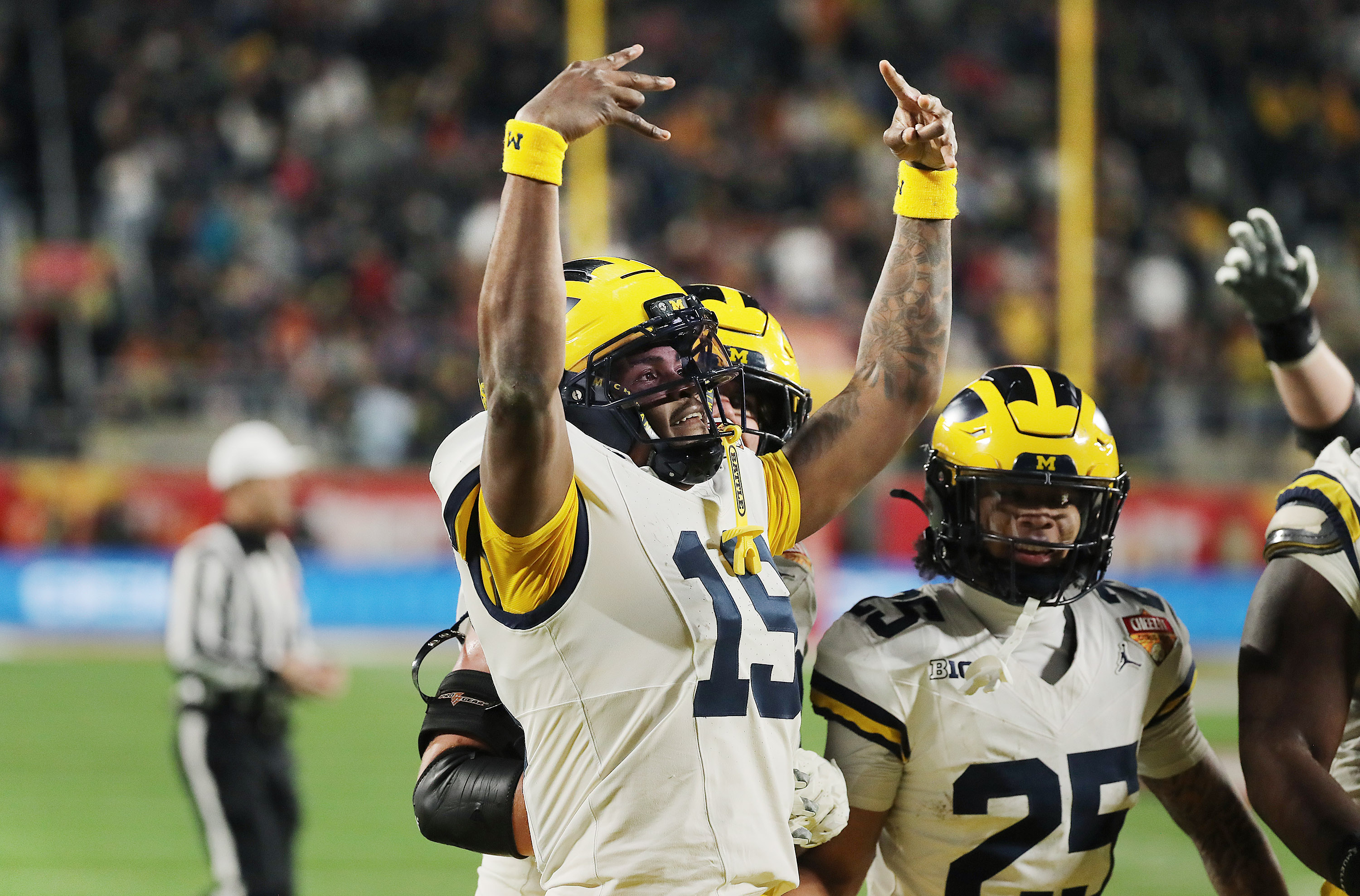 during the Cheez-It Citrus Bowl game of Michigan versus Texas...