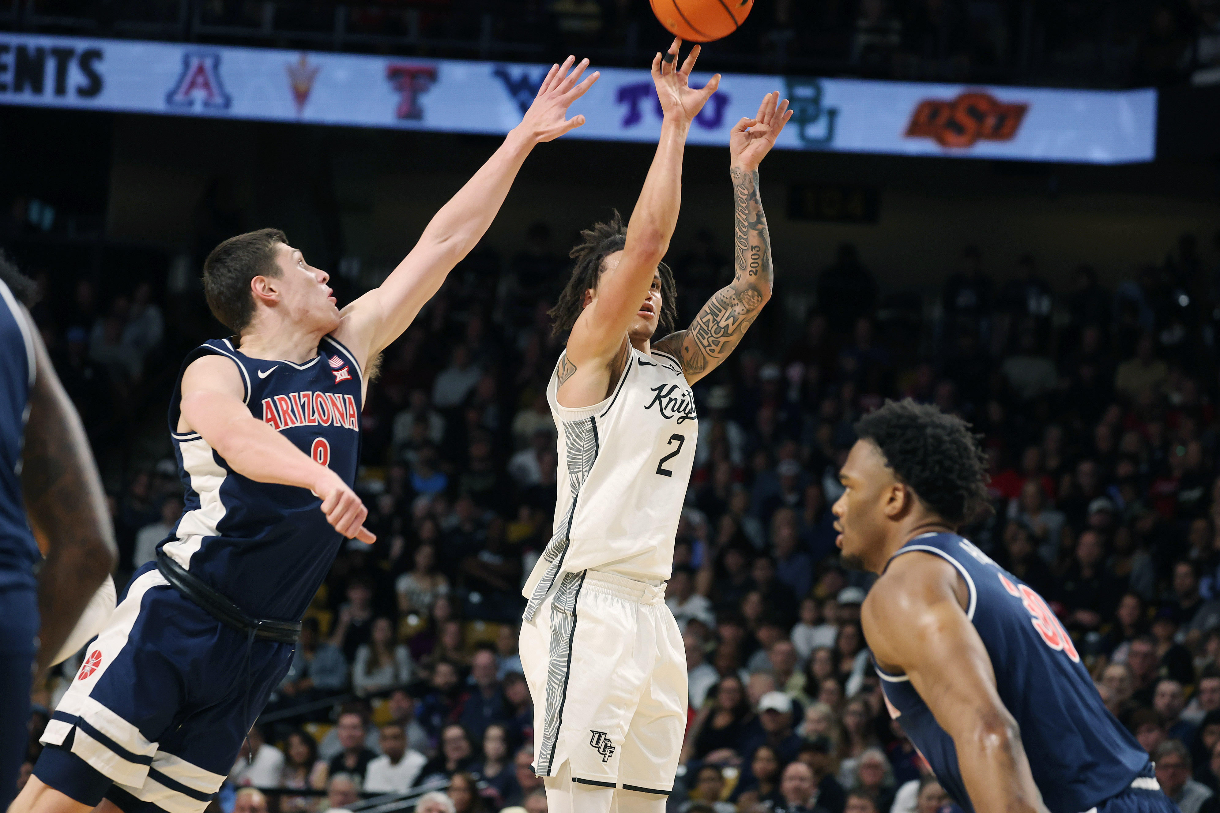 UCF guard Riley Kugel (2) shoots during the Arizona at...